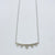 NSC - Curved bar triangle drop necklace