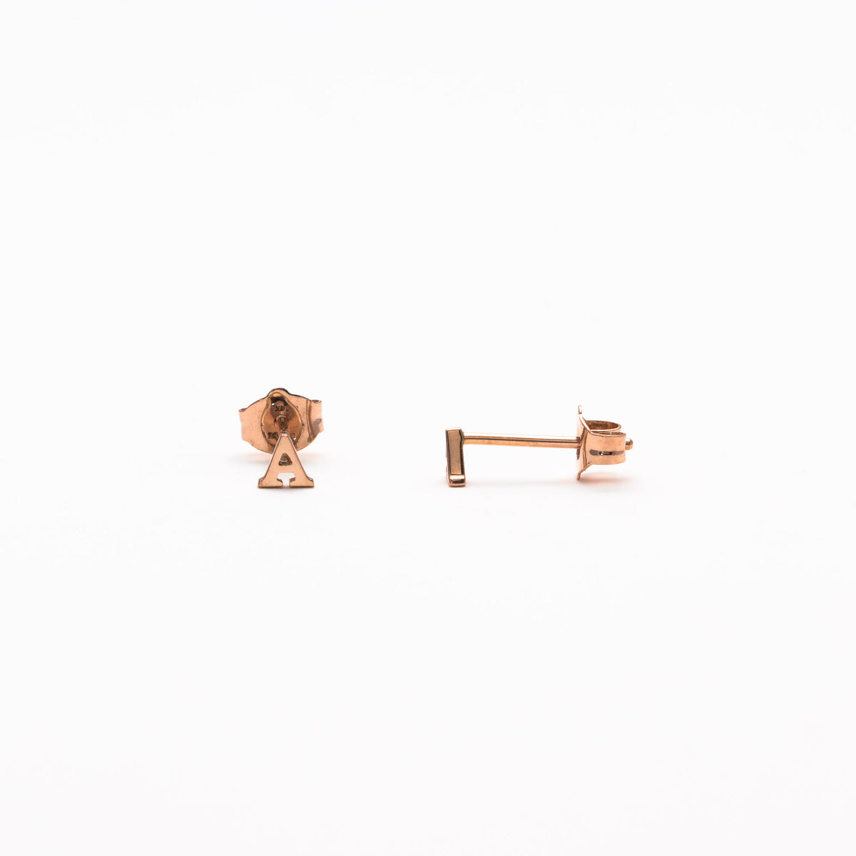 Single initial studs in rose gold