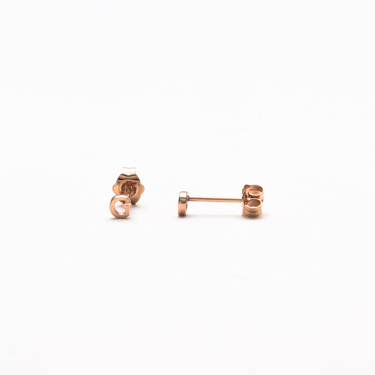 Single initial studs in rose gold