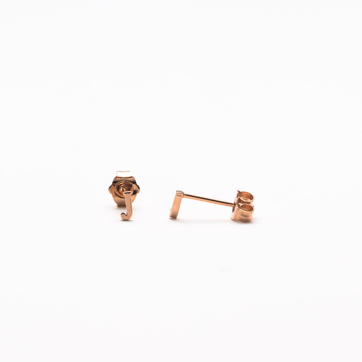 Single initial studs in rose gold