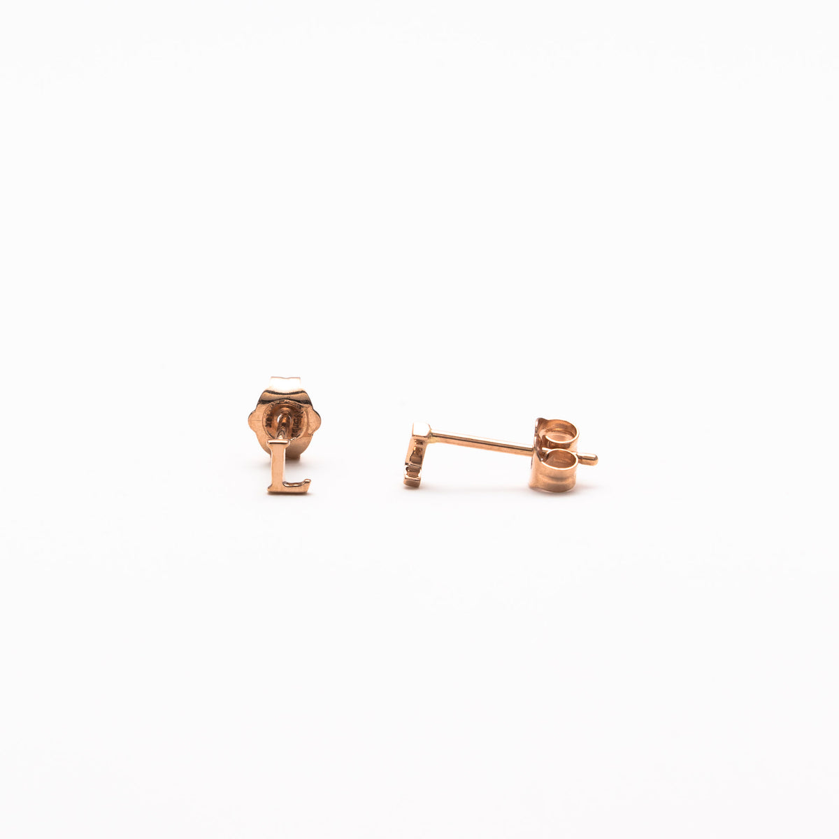 Single initial studs in rose gold