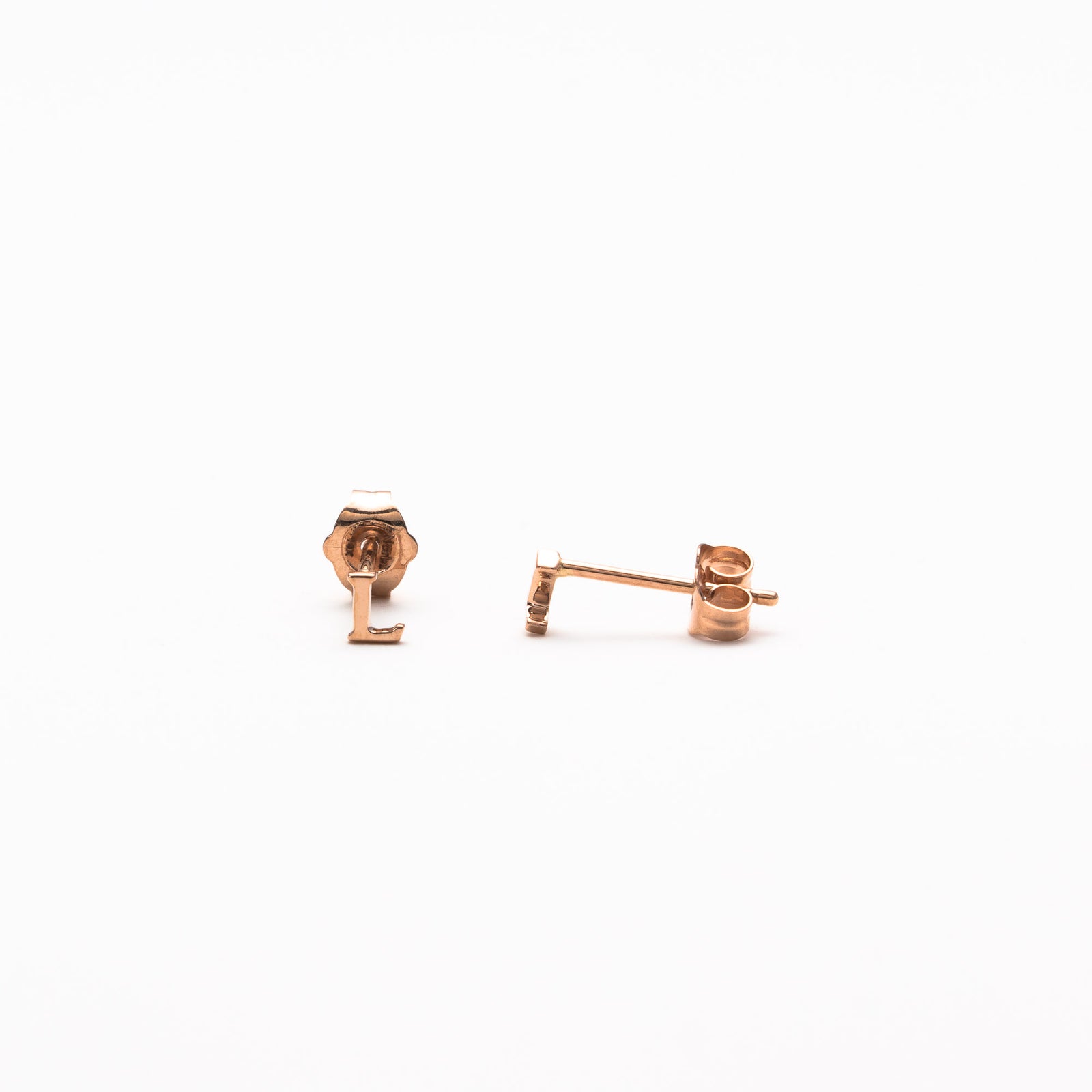 Single initial studs in rose gold