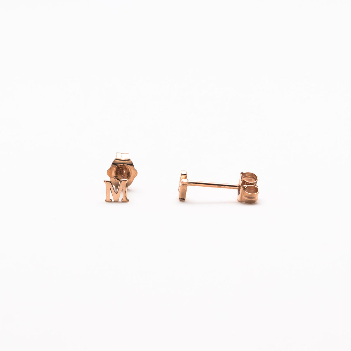 Single initial studs in rose gold