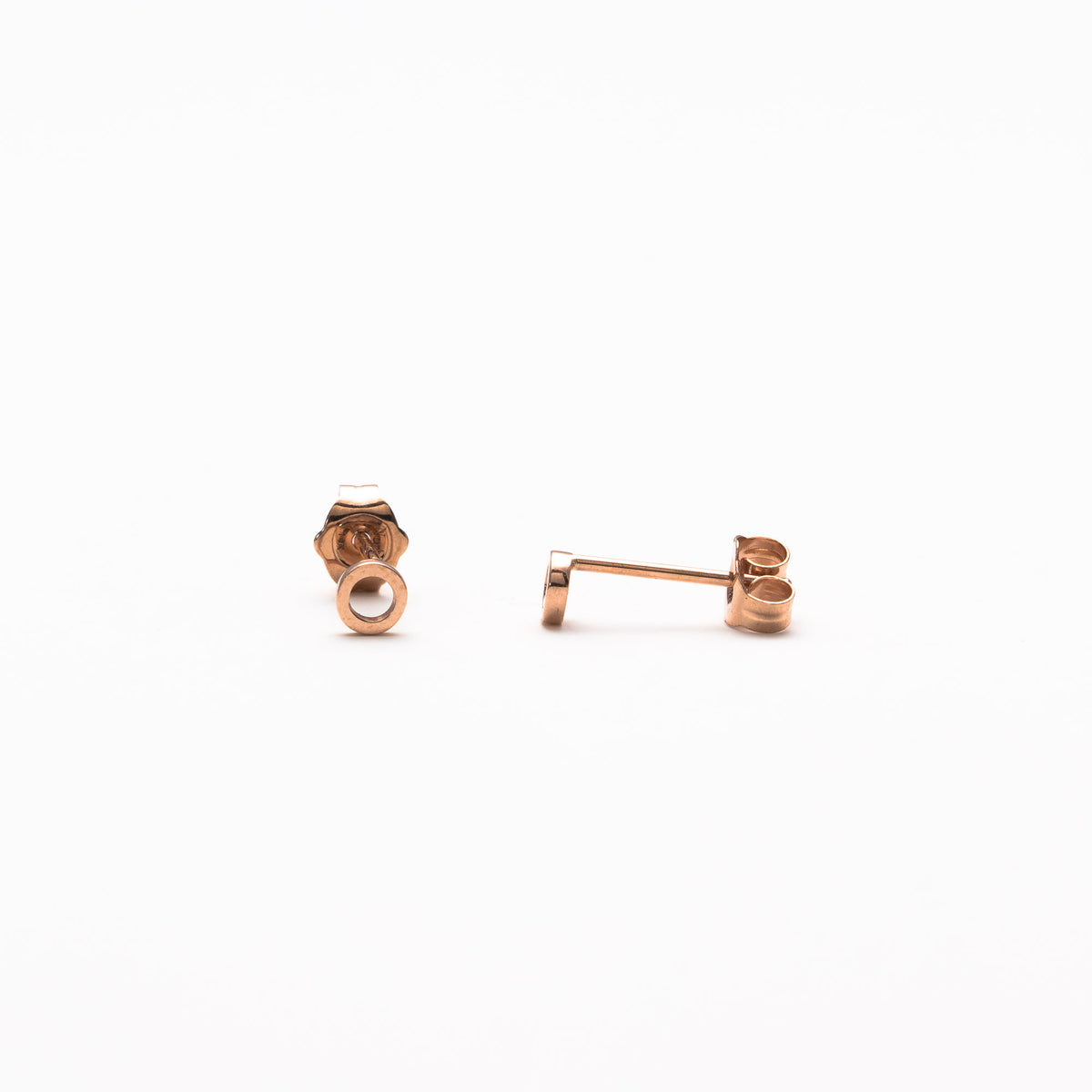 Single initial studs in rose gold