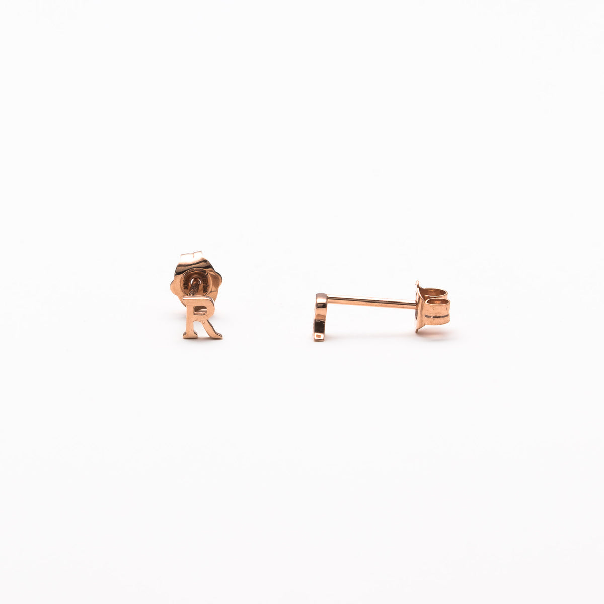 Single initial studs in rose gold
