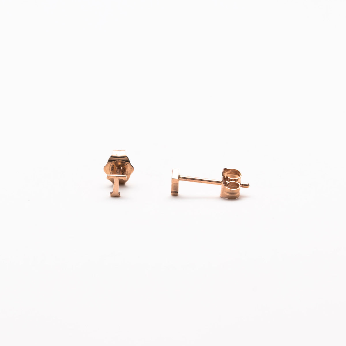 Single initial studs in rose gold