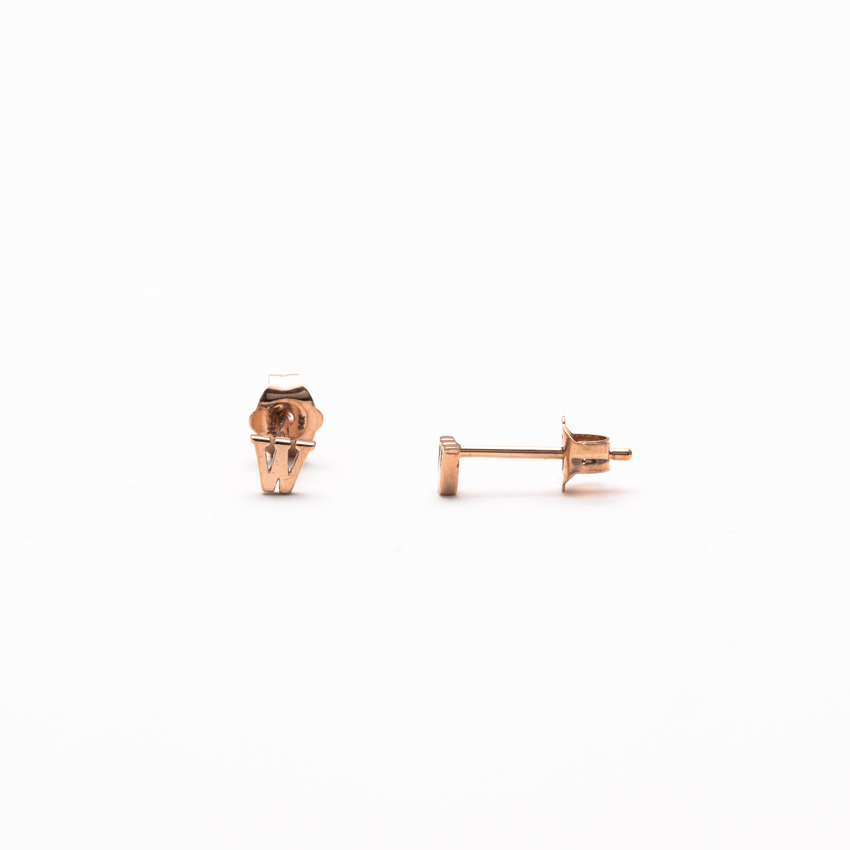 Single initial studs in rose gold