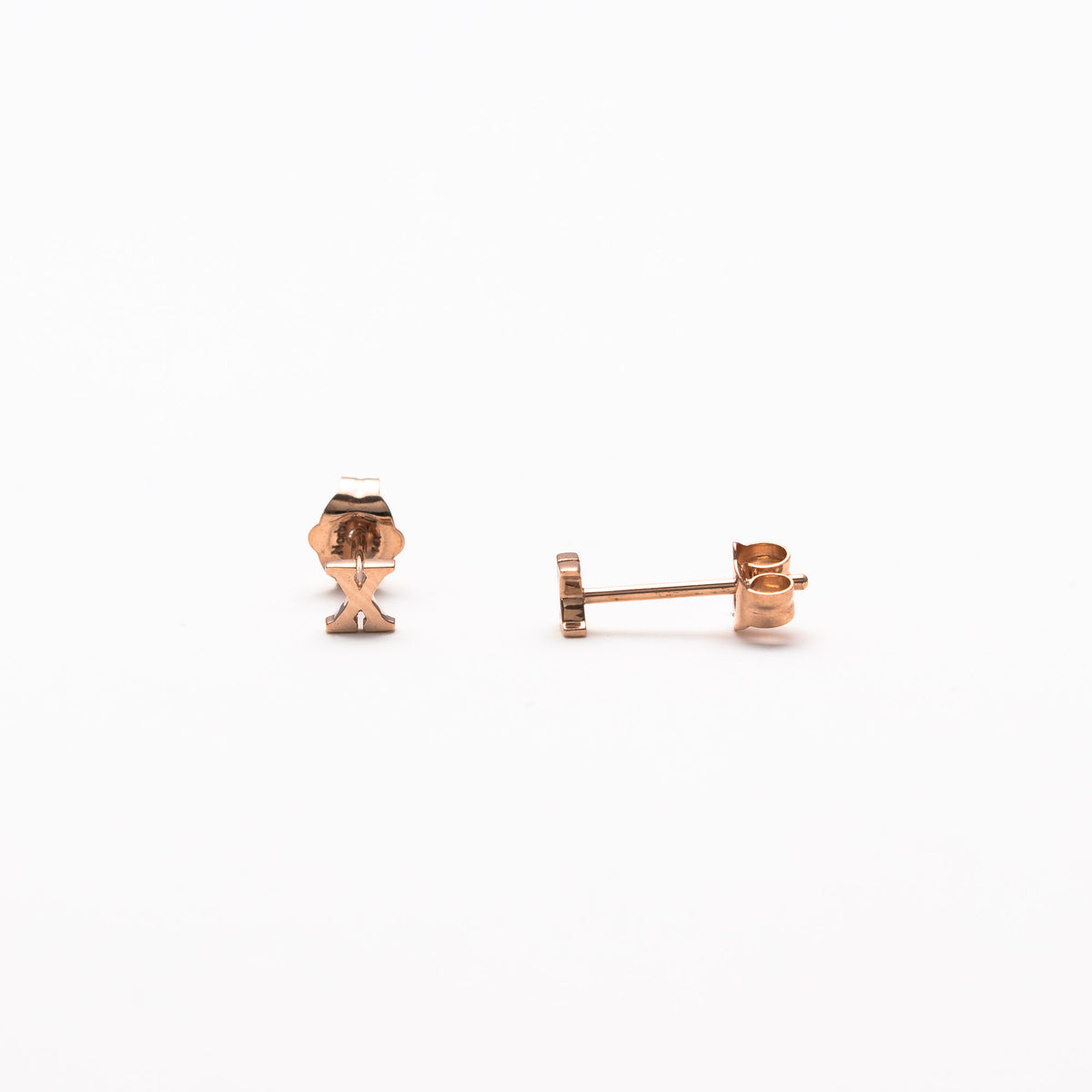 Single initial studs in rose gold