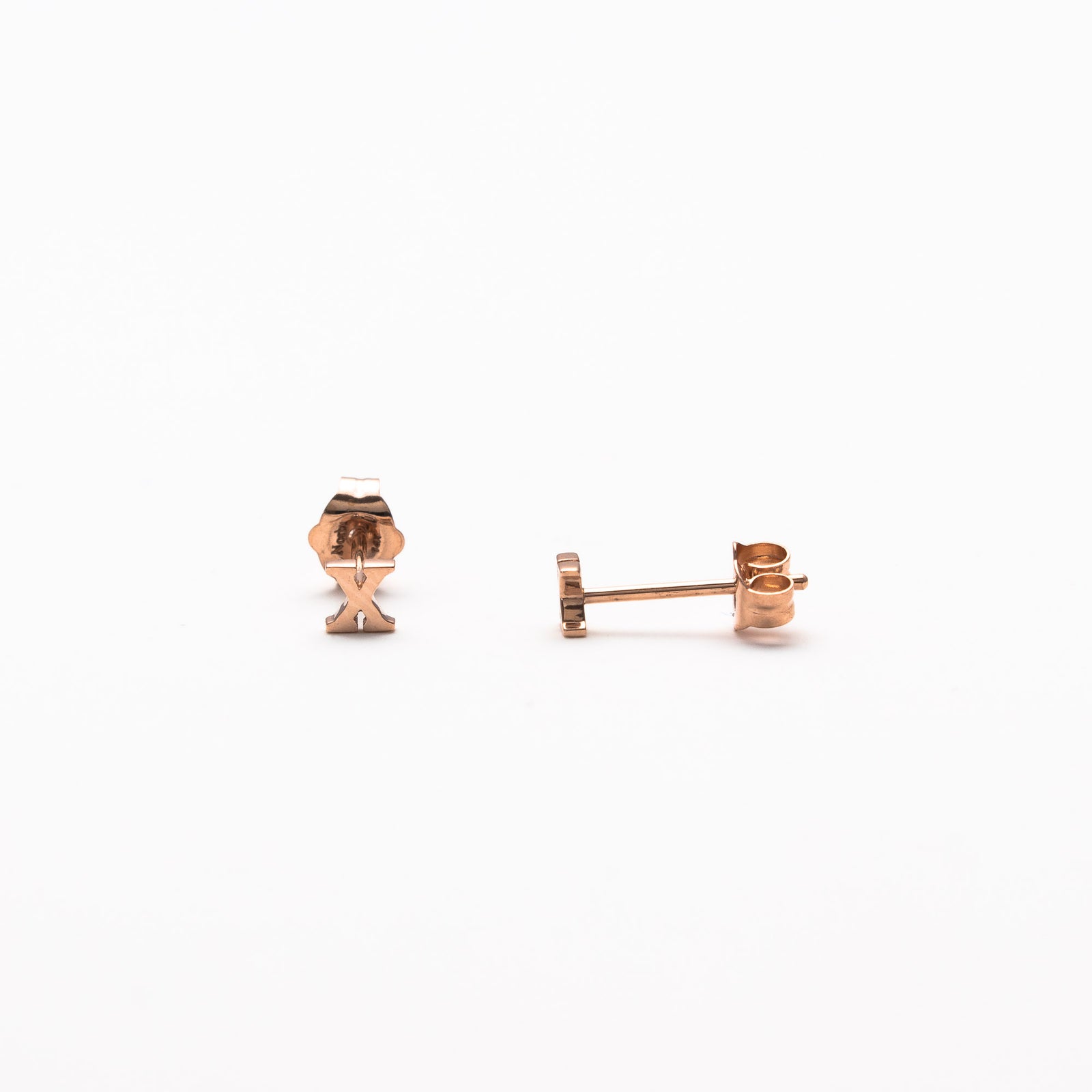Single initial studs in rose gold
