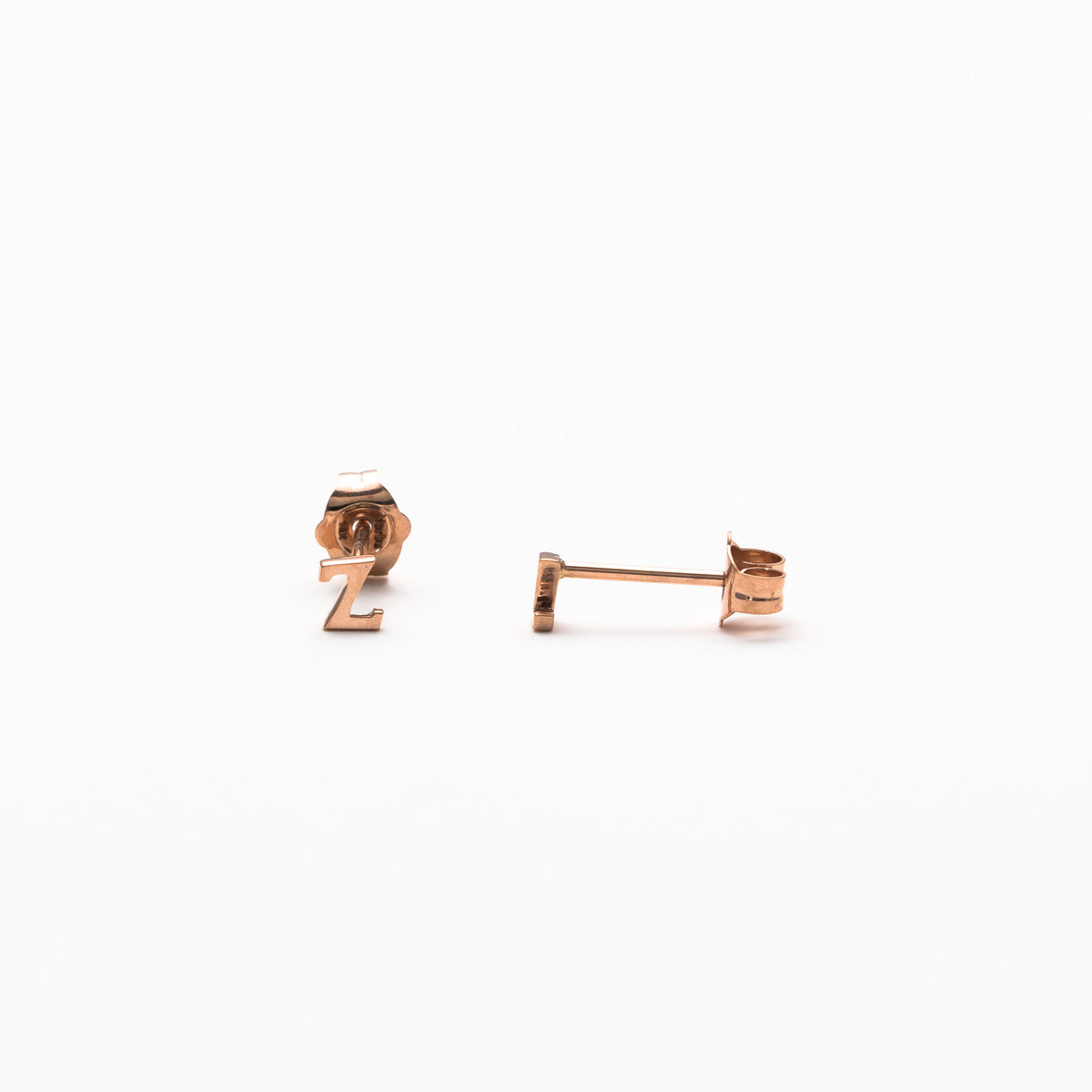 Single initial studs in rose gold