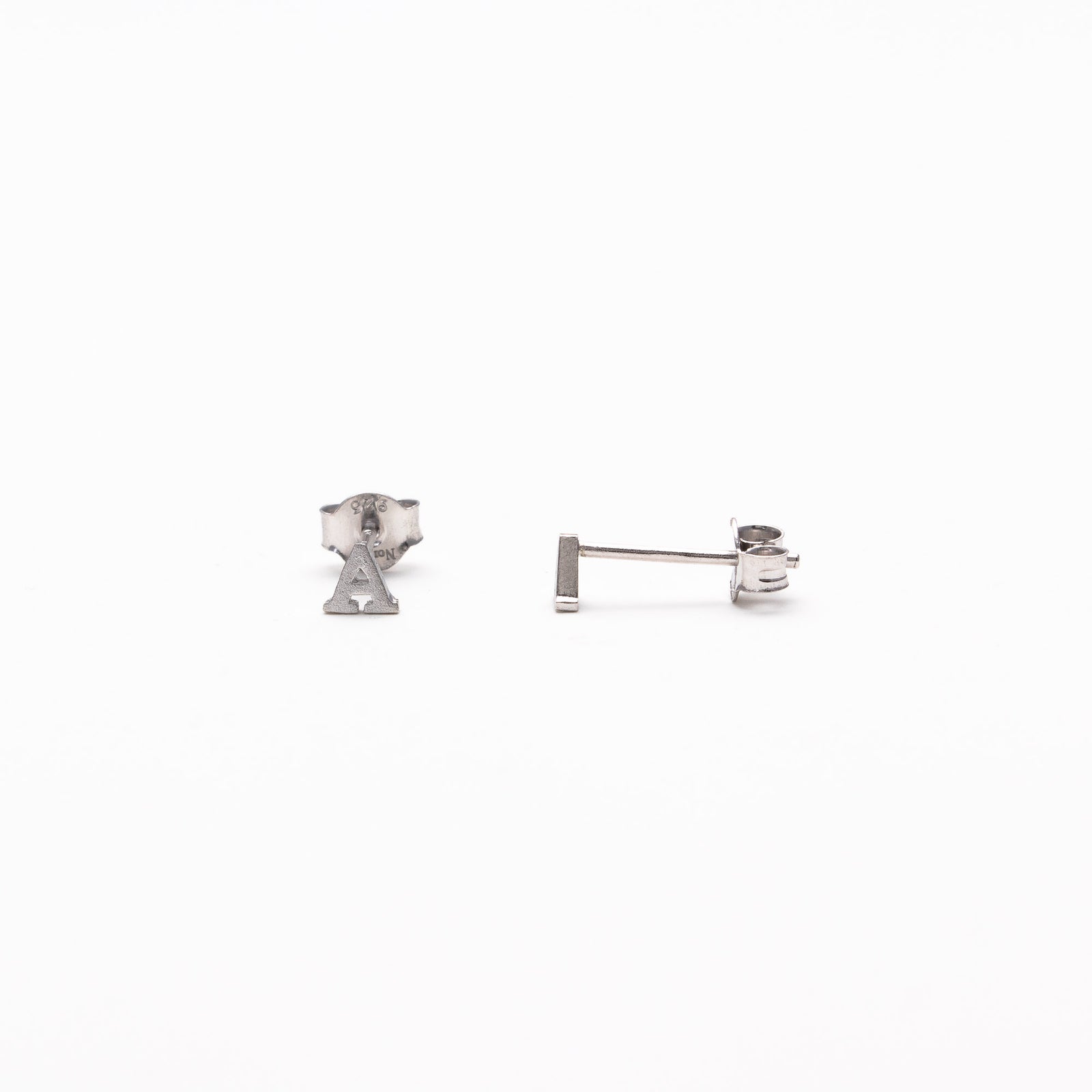 Single initial studs in silver