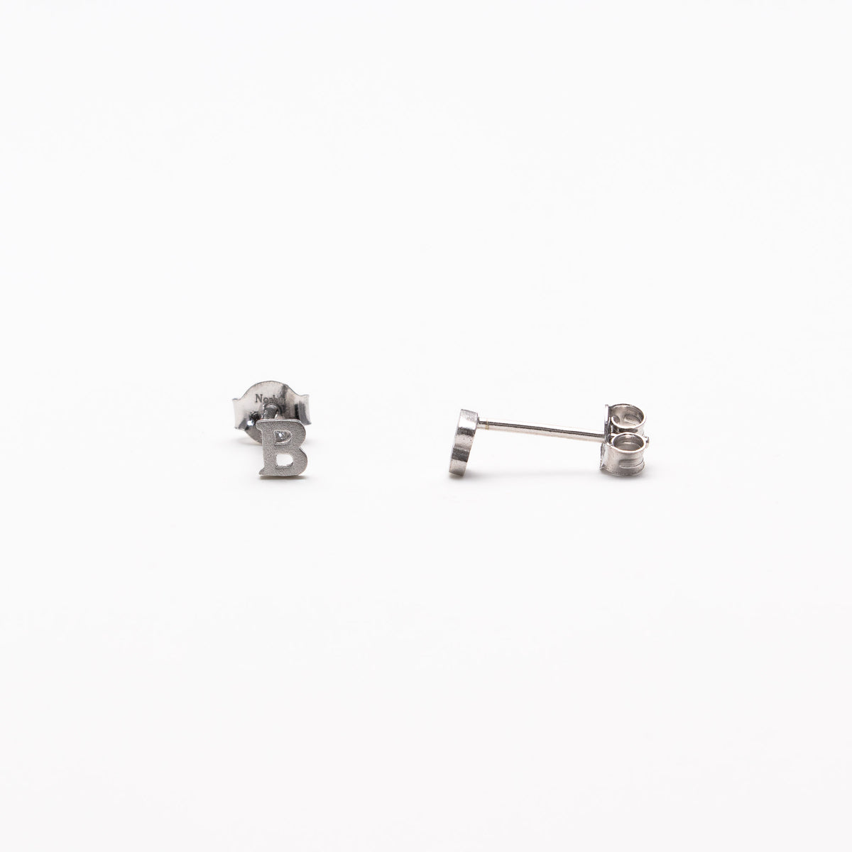 Single initial studs in silver