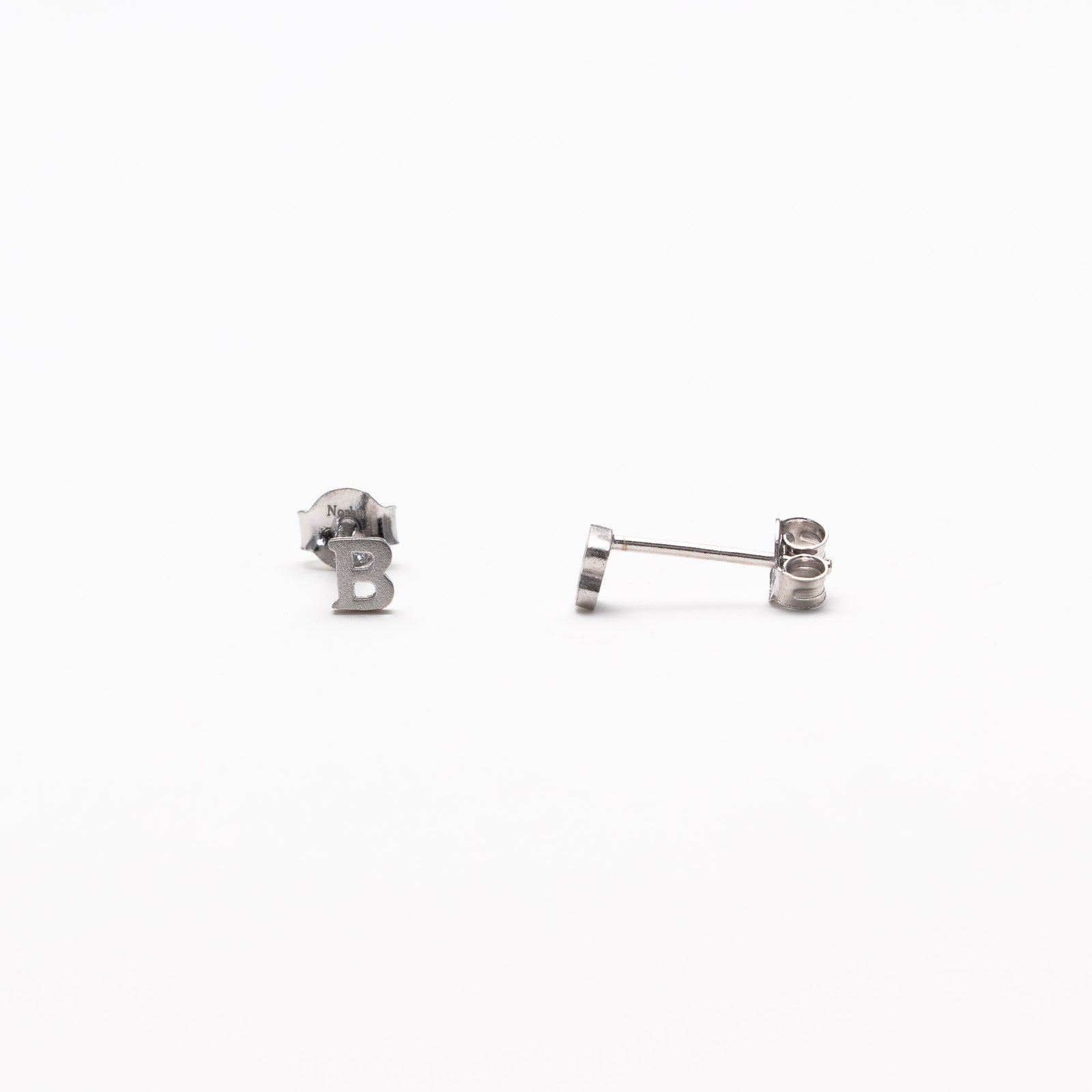 Single initial studs in silver