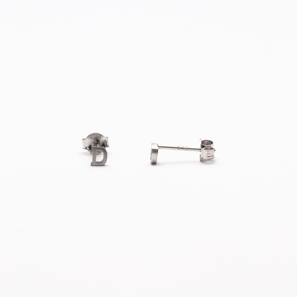 Single initial studs in silver