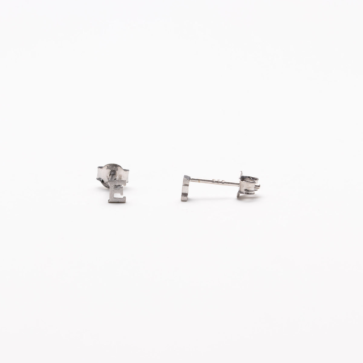 Single initial studs in silver
