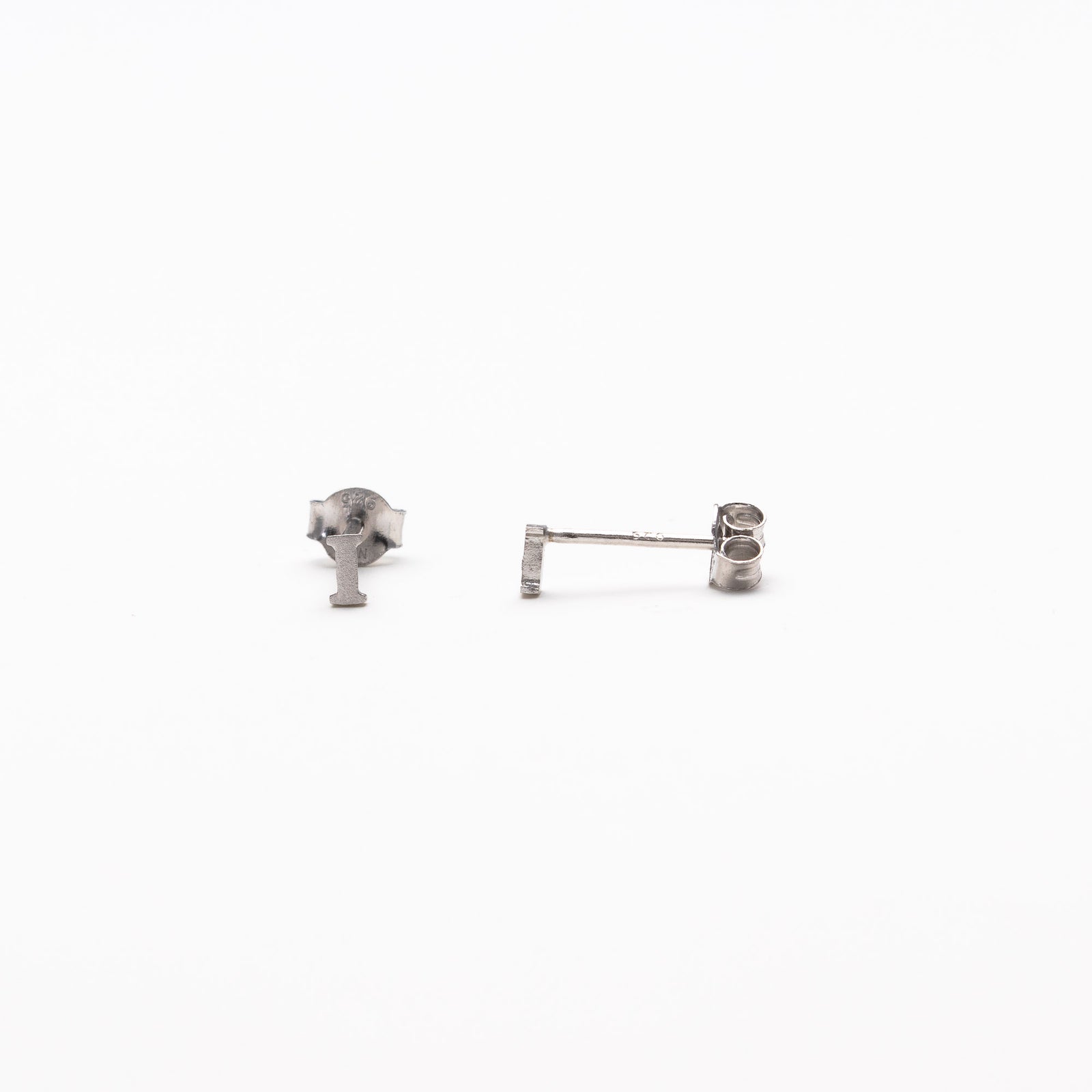 Single initial studs in silver