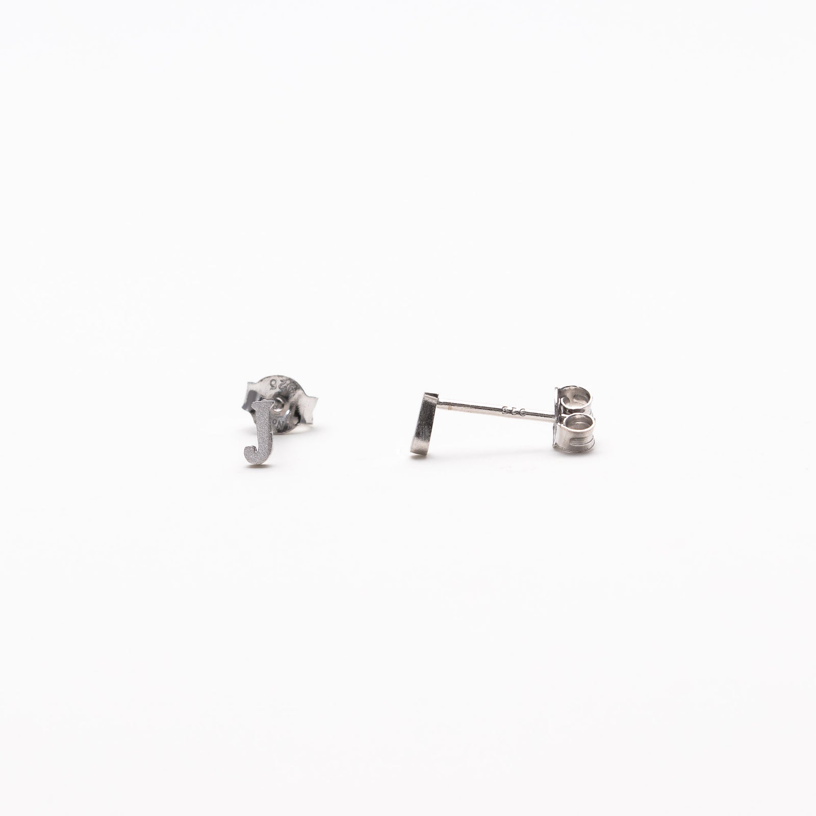 Single initial studs in silver