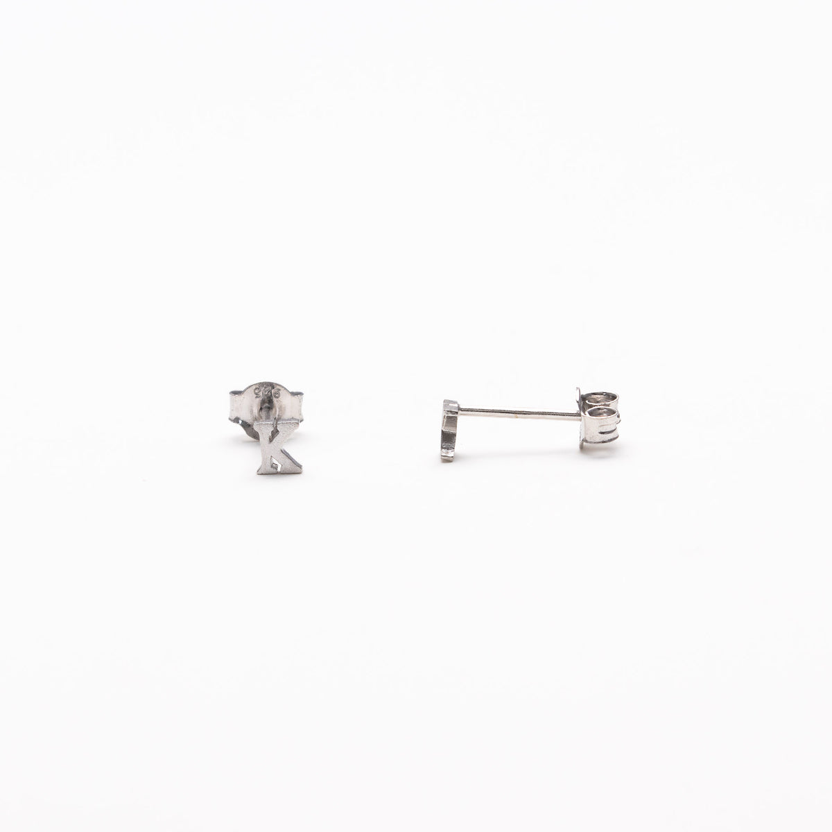 Single initial studs in silver