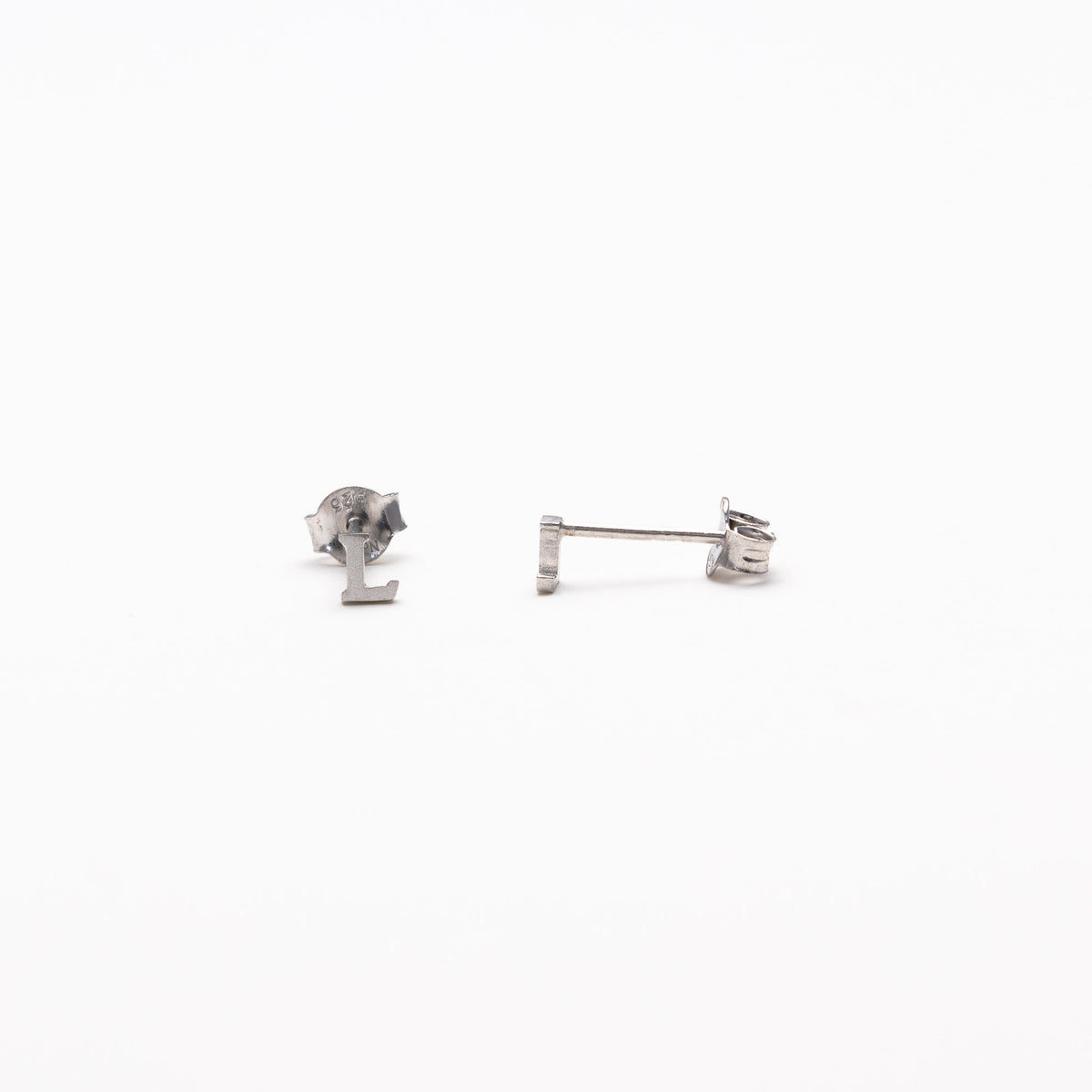 Single initial studs in silver