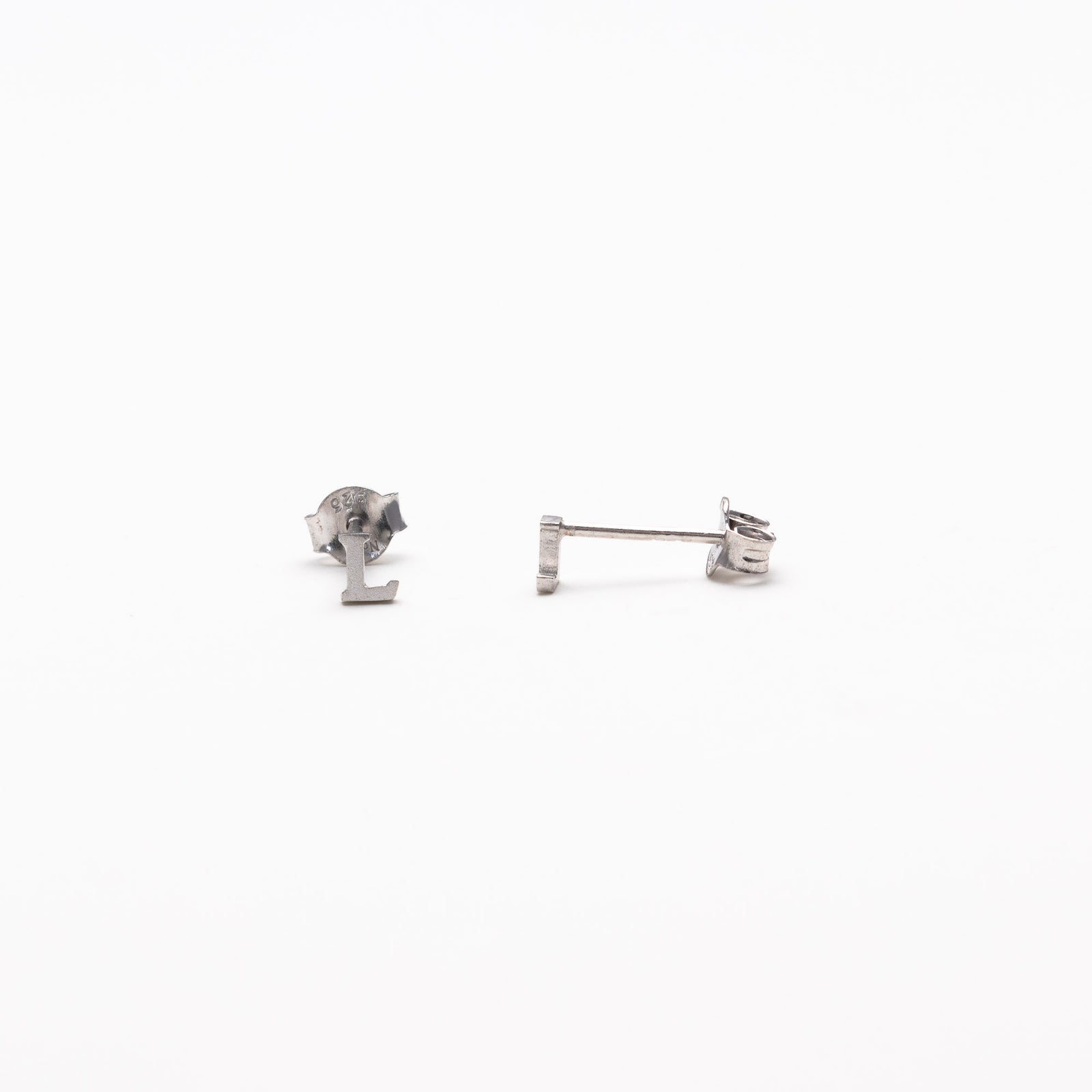 Single initial studs in silver