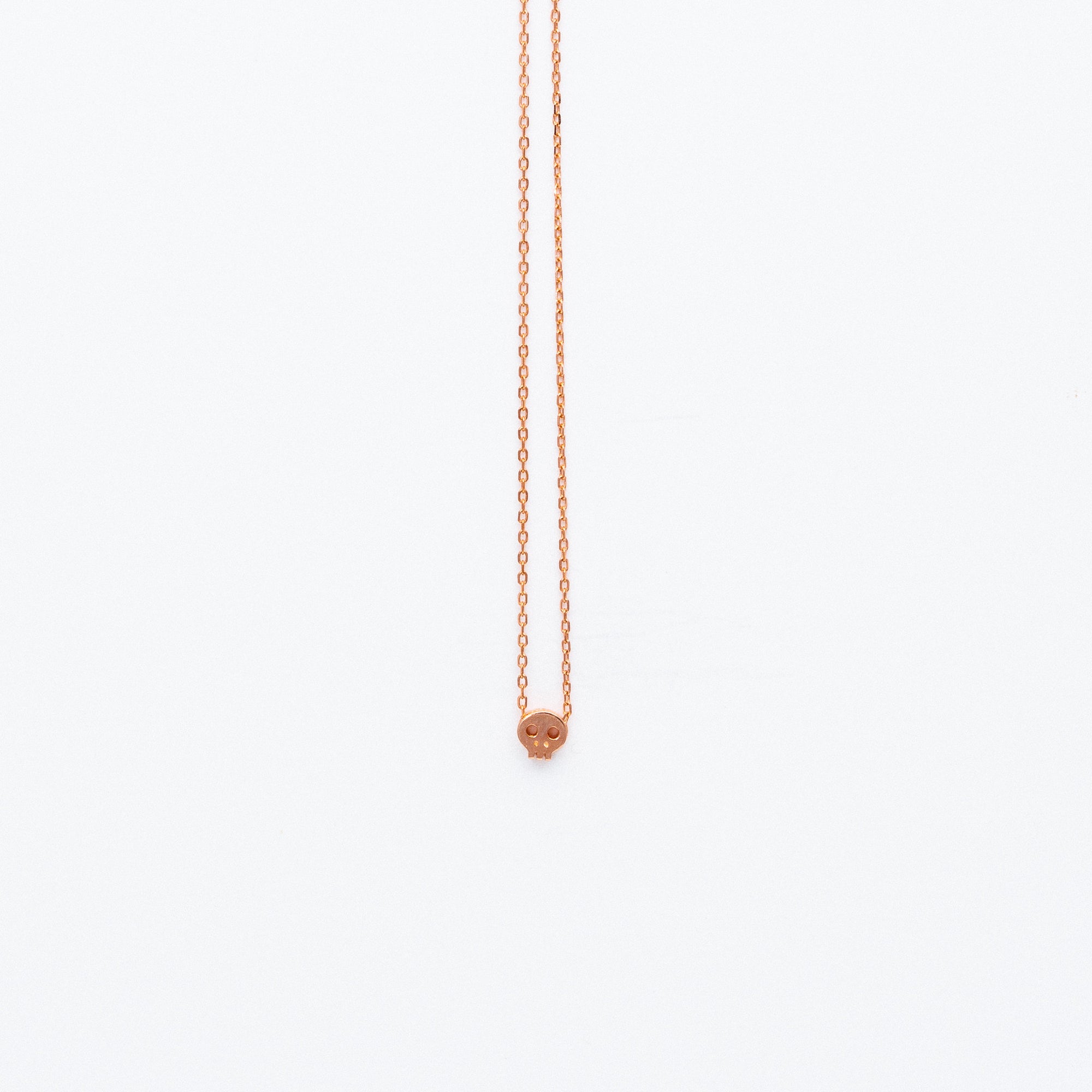 NSC - Tiny Skull Necklace in Gold Plated